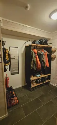 a room with a bunch of racks of clothes at Apartment Røldalsfjellet in Håra