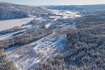 an aerial view of a resort in a forest at New and great cabin at the foot of Norefjell in Noresund