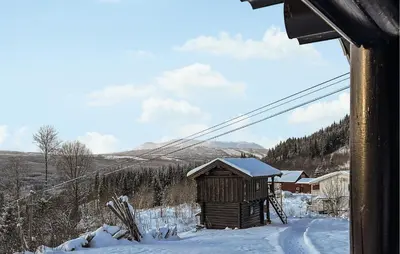 a small building in the snow next to a ski lift at Awesome Home In Nybergsund With Wifi in Nybergsund