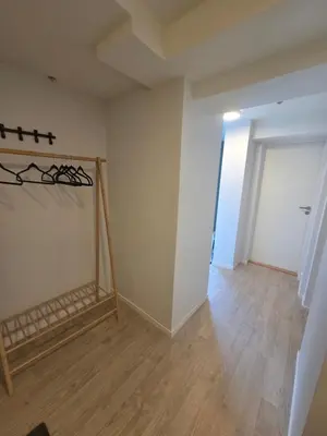 an empty room with a closet and a door at Central 2-Bedroom Apartment in Voss in Vossevangen