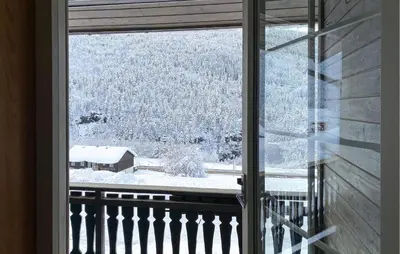 a window with a view of a snow covered field at Gorgeous Apartment In Verma With Wifi in Verma