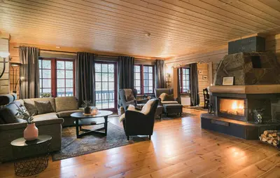 a living room filled with furniture and a fireplace at 2 Bedroom Gorgeous Apartment In Bjorli in Bjorli