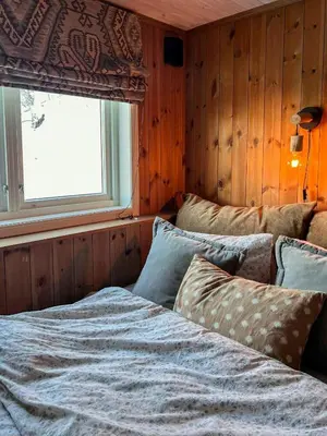 a bedroom with a bed and a window at Wonderful Cottage For Active Families In Hemsedal in Hemsedal