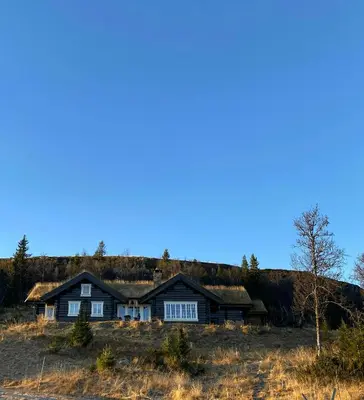 a house sitting on top of a hill at Log Cabin With A View At Golsfjellet in Gol