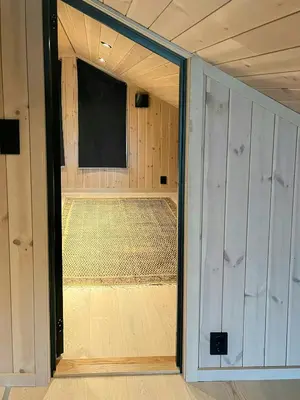 an open door to a room with a net at Cabin At Groholsfjellet For Active Days in Veggli