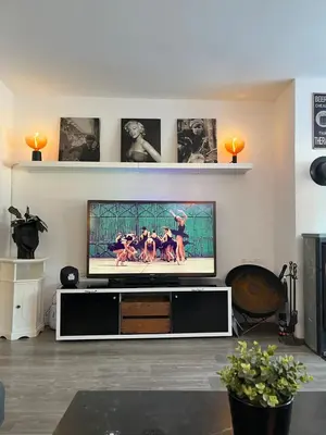 a living room with a flat screen tv at Prime Location - Cozy and Big House in Vossevangen