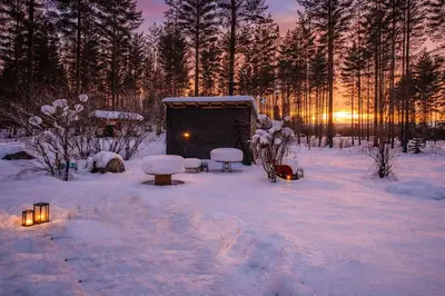 a snow covered area with a tent in a forest at Grandma Guest House, Rena Near Ski, Biking, River summer camp in Åmot