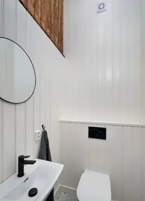 a white bathroom with a sink and a toilet at Winter paradise Norefjell in Surteberg