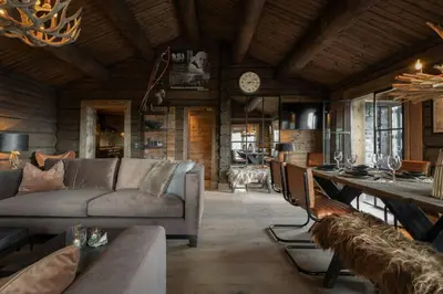 a living room with a couch and a table at Fjellhytte Med Panorama På Toppen Av Norefjell in Noresund
