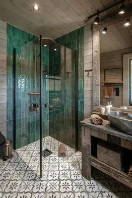 a bathroom with a glass shower and a sink at Designer Cabin For 16 With Spa In Turufjell in Flå