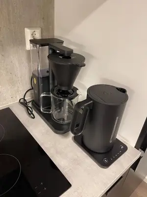 a coffee maker sitting on top of a counter at Modern apartment - Balcony, Parking, BBQ in Vossevangen
