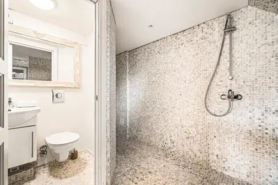 a bathroom with a shower and a toilet at A Dream Home with Spectacular Views - NEW! in Bergen