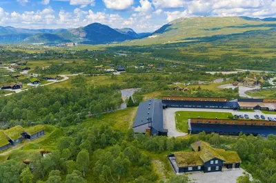 an aerial view of a building with a grass roof at Leilighet på Hovden in Bykle