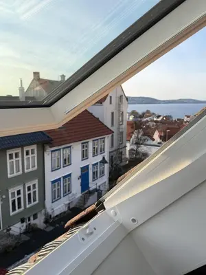 a view from the window of a house at Cozy loft apartment in the heart of Bergen in Bergen