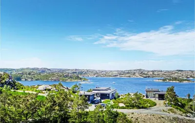 an estate with a view of a lake at Beautiful Home In Fitjar in Fitjar