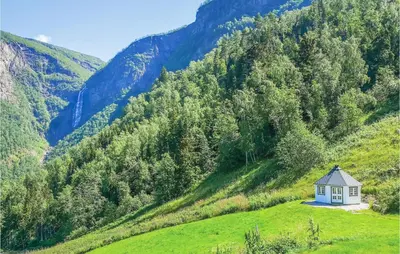 a small house on the side of a mountain at 4 Bedroom Stunning Home In Skjolden in Skjolden