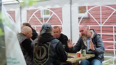 a group of people sitting at a table at Frya Leir in Frya