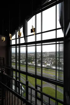 a large window in a building looking out at an airport at Quality Hotel Panorama in Trondheim