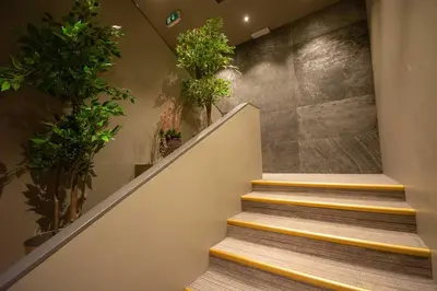 a set of stairs with potted plants on them at Trysil-Knut Hotel in Trysil