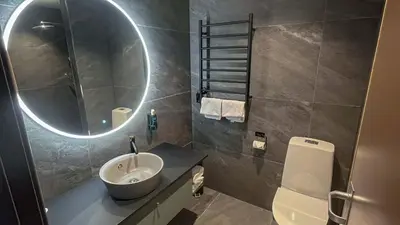 a bathroom with a sink and a mirror at Trysil-Knut Hotel in Trysil