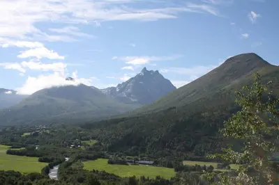 a view of a valley with mountains in the background at Klara House in Isfjorden