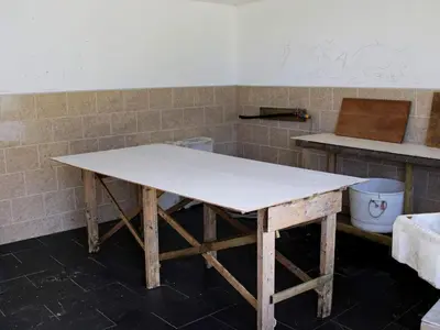 a large white table in a room with a wall at 5 person holiday home in Selje-By Traum in Selje