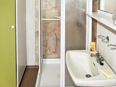 a bathroom with a sink and a shower at 8 person holiday home in Liabygda-By Traum in Eidsdal