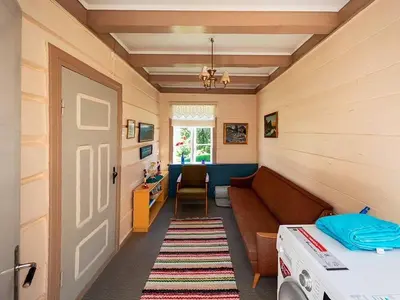 a hallway with a couch and a table in a room at 8 person holiday home in Liabygda-By Traum in Eidsdal