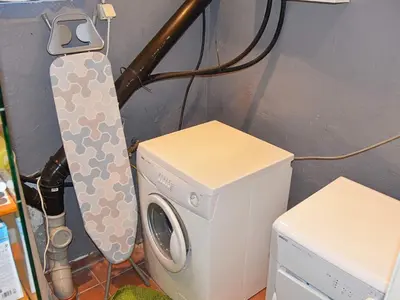 a washer and dryer next to a washing machine at 10 person holiday home in Folkestad in Folkestad