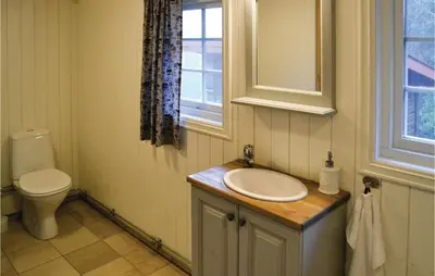 a bathroom with a sink and a toilet at Three-Bedroom Holiday Home In Sjusjoen in Sjusjøen