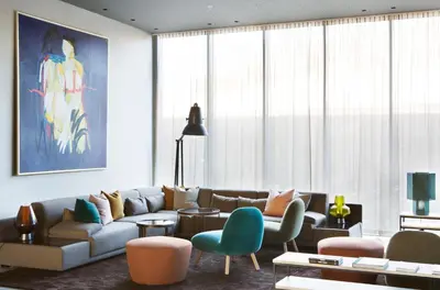 a living room with a couch and chairs at Comfort Hotel Bergen Airport in Bergen