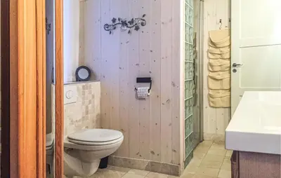 a bathroom with a toilet and a sink at Sjusjøen-Pihl 89 in Sjusjøen