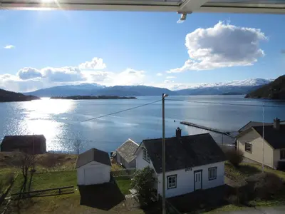 a view of a body of water from a house at Hardanger Rom & Harmonium 
