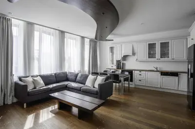 a living room with a couch and a table at Prize by Radisson, Xhibition Bergen City in Bergen