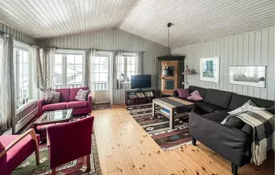a living room with a couch and a tv at Amazing Home In Kvam With Kitchen in Kvam