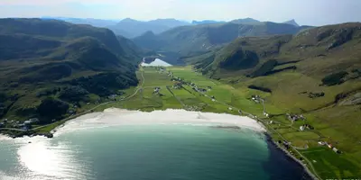 an aerial view of a beach and a body of water at Thon Hotel Måløy in Måløy