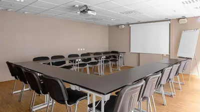 a conference room with a large table and chairs at Comfort Hotel Trondheim in Trondheim