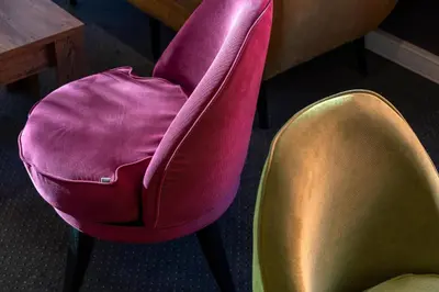 two chairs sitting next to each other in a room at Thon Hotel Storgata in Kristiansund