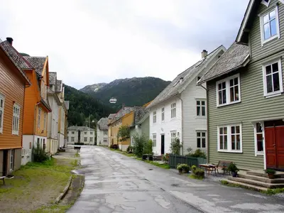 an empty street in a town with houses at Rongahuset BnB in Evanger