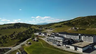 an aerial view of a building in the mountains at Storefjell Resort in Gol