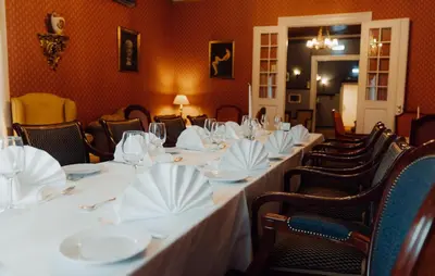 a room with a long table with white dishes on it at Best Western Tingvold Park Hotel in Steinkjer