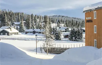 a snow covered village with a skateboard ramp at Nordseter Sportell 271 in Lillehammer