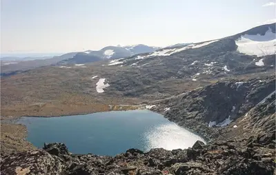 an aerial view of a lake on the side of a mountain at Amazing Home In Vågå With Kitchen in Vaga