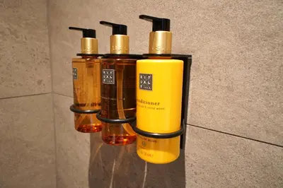 a group of three fire hydrants hanging on a wall at Lillehammer Turistsenter Budget Hotel in Lillehammer