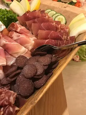 a tray of meat and other meats and vegetables at Øigardseter Fjellstue in Høvringen