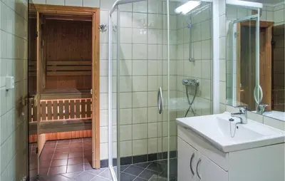 a bathroom with a shower and a sink and a shower at Cozy Apartment In Hemsedal With Sauna in Hemsedal