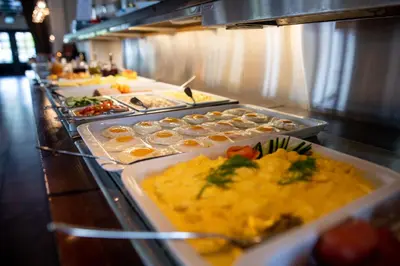 a buffet line with many different types of food at Stryn Hotel in Stryn