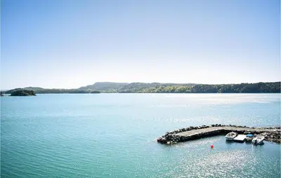 an aerial view of a large body of water with boats at Lovely Home In Valevåg With Wifi in Valevåg