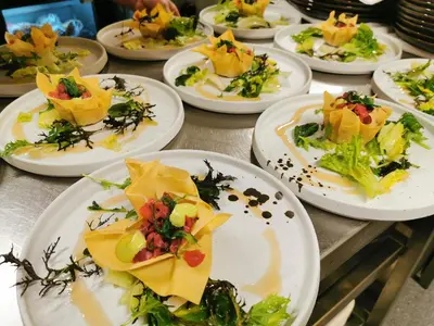 a bunch of plates of food on a table at Grønolen Fjellgard in Beitostøl