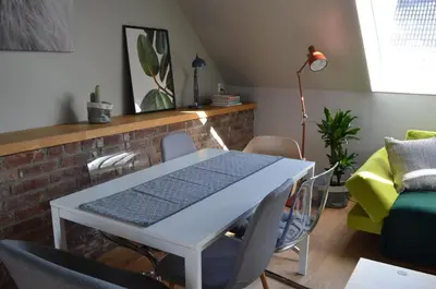 a table with a mat on it in a living room at MB Apartments in Bergen
